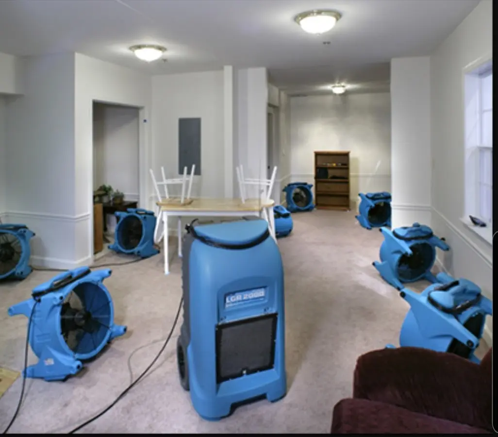 Air movers and dehumidifier setup for Water Damage Restoration in Bartlesville
